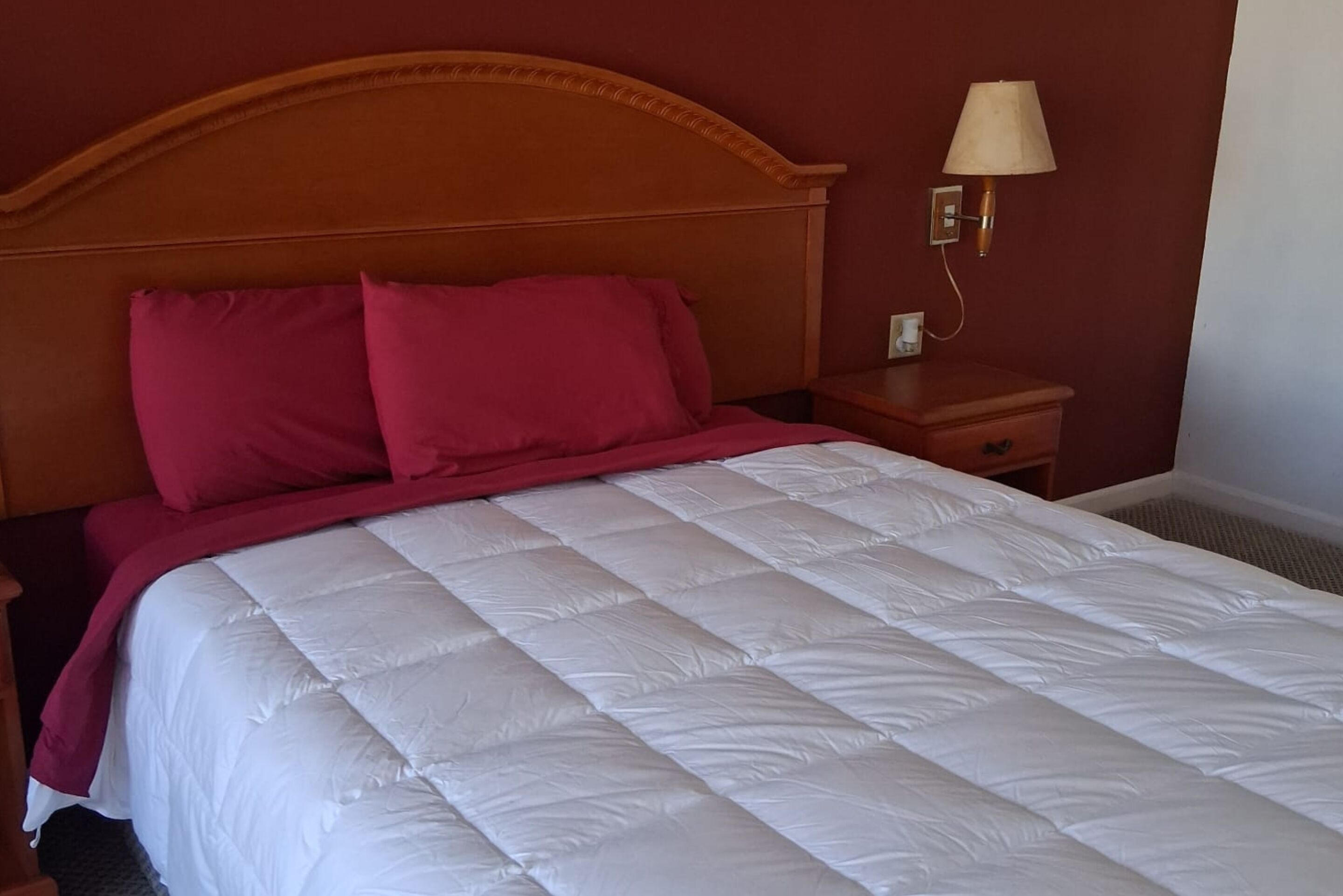 deluxe room, 1 queen bed, non smoking | desk, laptop workspace, blackout curtains, soundproofing