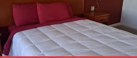 Deluxe Room, 1 Queen Bed, Non Smoking | Desk, laptop workspace, blackout drapes, soundproofing