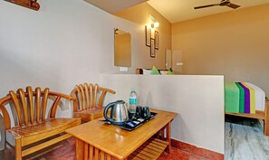 Standard Room | Living area | 32-inch flat-screen TV with cable channels, TV - Treebo Avyukta Stay, 1.5 km to Madikeri Fort (Madikeri)