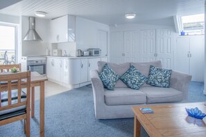 Apartment (1 Bedroom) | Living area | 32-inch TV with cable channels - St. Julians View - 1 Bedroom - Tenby (Tenby)