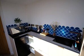 Fridge, microwave, coffee/tea maker, electric kettle