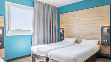 Escritorio, insonorización, wifi gratis y ropa de cama