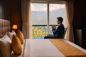 Quarto executivo, sacada, vista para a montanha | 1 quarto, frigobar, escrivaninha, espaço de trabalho para notebook