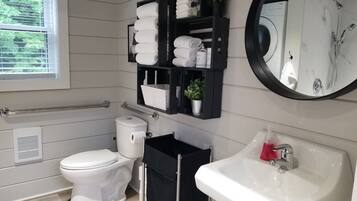 Shower, hair dryer, towels, soap