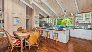 Enjoy cooking in this well-appointed kitchen with a central island and bar stools.