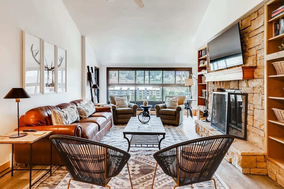 LCD TV, fireplace, books, offices