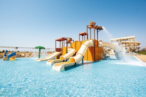 A water park with multiple slides and a pool. - Hotel Riu Baobab - All Inclusive (Pointe Saréne)