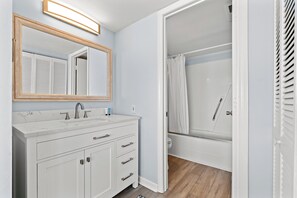 Combined shower/bathtub, hair dryer - Carolina Dunes 301-3BR/2BA Oceanfront condo in Cherry Grove (North Myrtle Beach)
