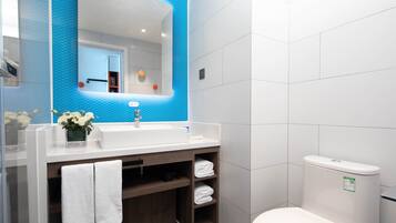 Shower, rainfall showerhead, designer toiletries, hair dryer