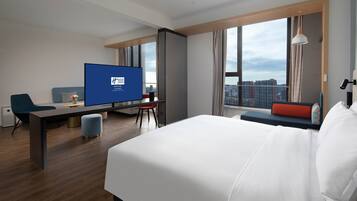 Suite, 1 King Bed | Down comforters, in-room safe, desk, laptop workspace