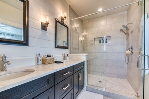 Combined shower/tub, hair dryer, towels, soap