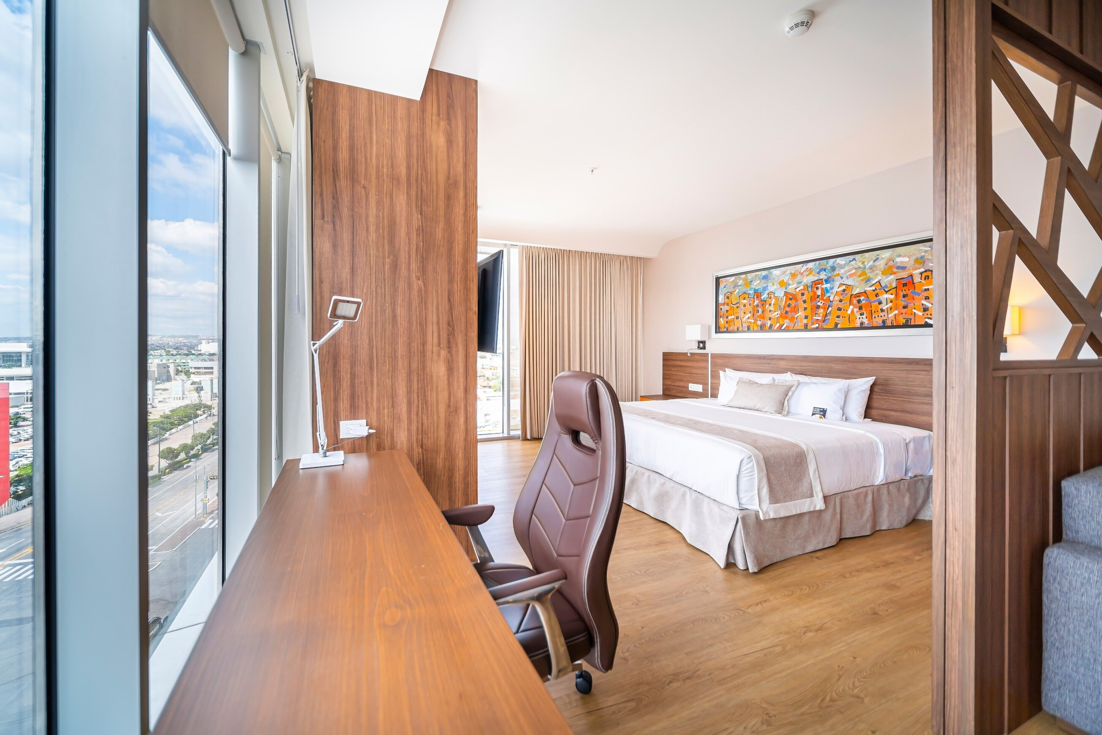 family room | premium bedding, minibar, in-room safe, individually decorated