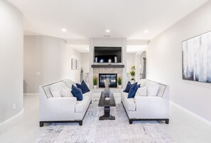 Smart TV, video games, DVD player, foosball