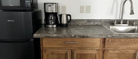 Fridge, microwave, coffee/tea maker, electric kettle