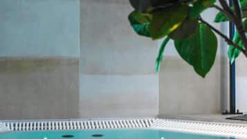 Relax in a serene hot tub surrounded by a tranquil atmosphere.
