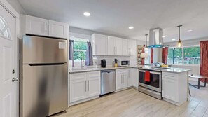 Fridge, microwave, oven, stovetop - Southwest Charm | Spacious Family Home Near Denver (Denver)