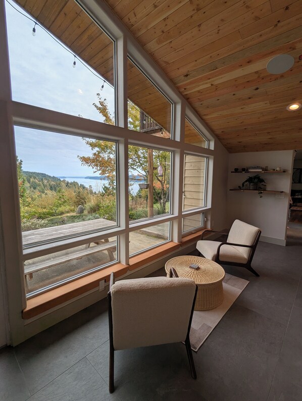 Interior - Modern retreat with serene canal, forest, and mountain views. (Lilliwaup)