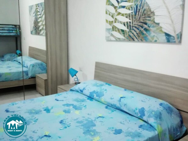 1 bedroom, desk, bed sheets