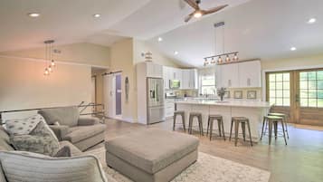 TV, fireplace, books, video library