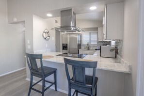 Apartment, 2 Bedrooms, Pool Access, Pool View | Private kitchen | Microwave, oven, dishwasher, coffee/tea maker - IRB Poolside Unit A Star5vacations (Indian Rocks Beach)