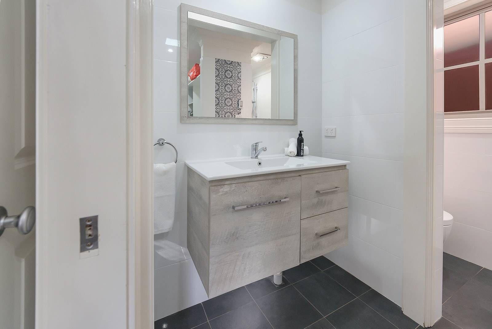 Shower, hair dryer, heated floors, towels