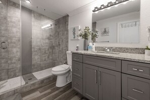 Combined shower/tub, hair dryer, towels, soap