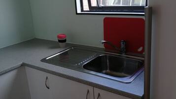 Fridge, microwave, electric kettle, toaster