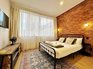 Iron/ironing board, free WiFi, bed sheets