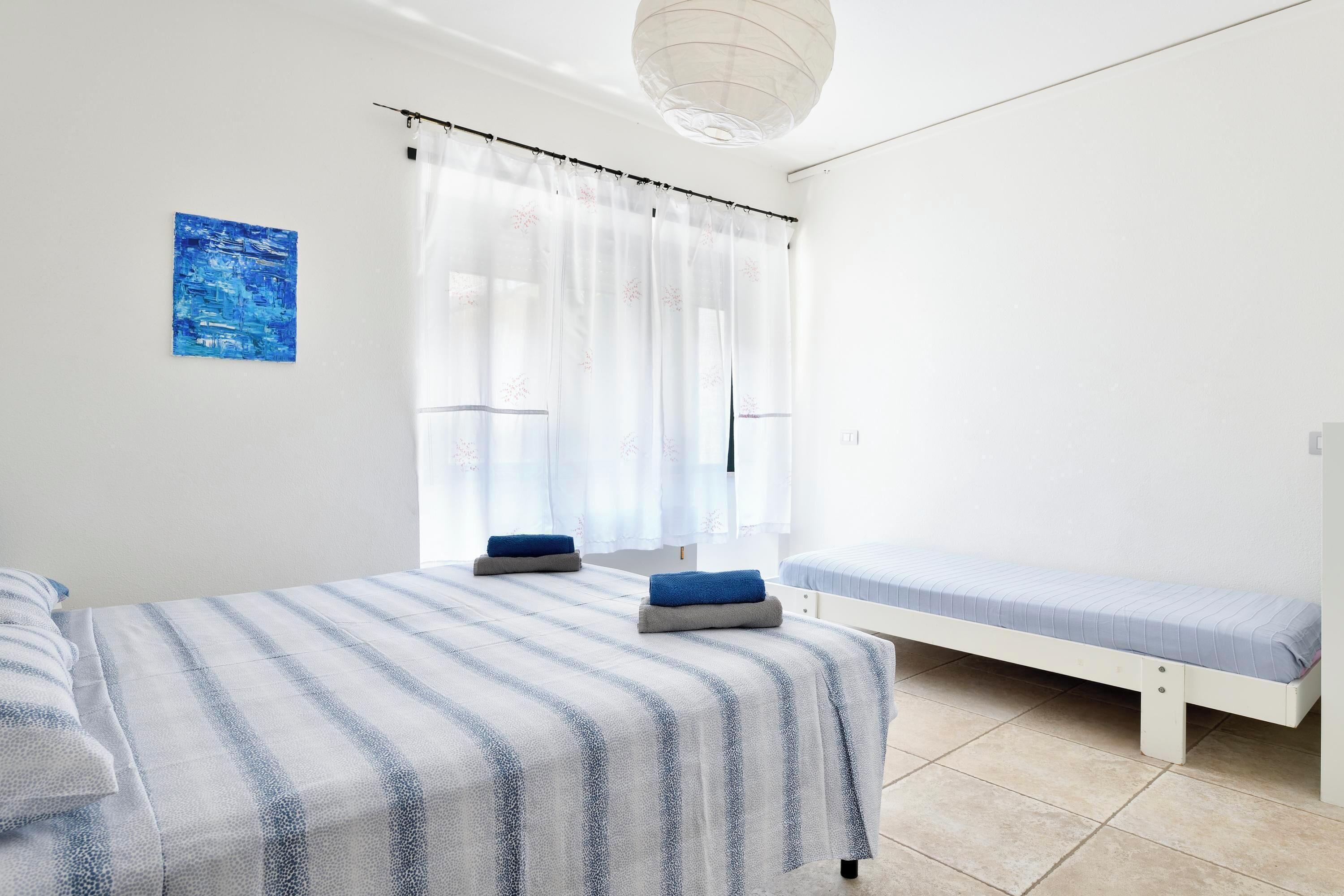 4 dormitorios, tabla de planchar con plancha, wifi gratis y ropa de cama