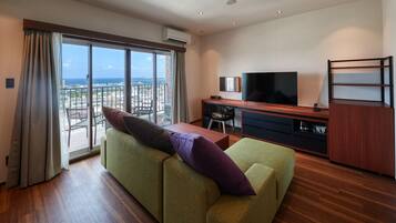 Junior Suite, Non Smoking | Living room | Flat-screen TV