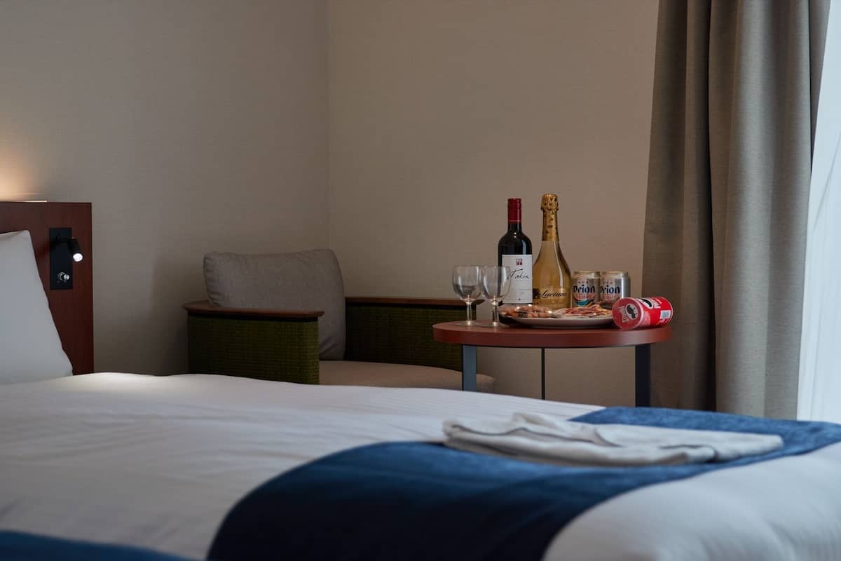 Desk, laptop workspace, free WiFi, bed sheets