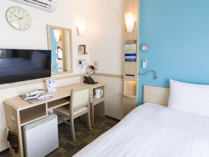 Quarto solteiro premium, para não fumantes | Escrivaninha, Wi-Fi de cortesia, roupa de cama