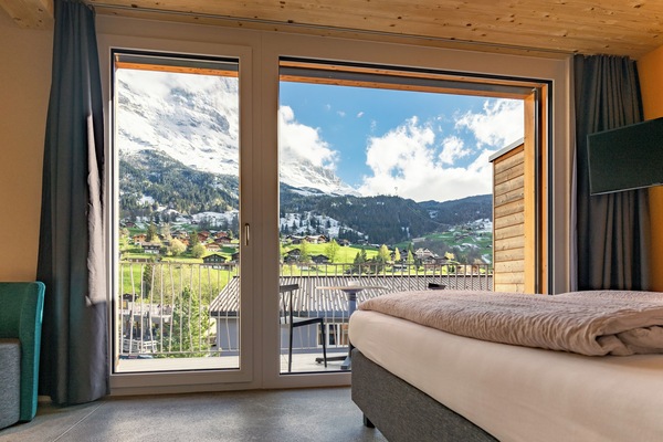 family room with balcony | Down comforters, WiFi (free), bed sheets
