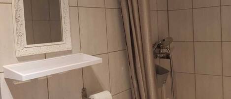Hair dryer, towels, toilet paper