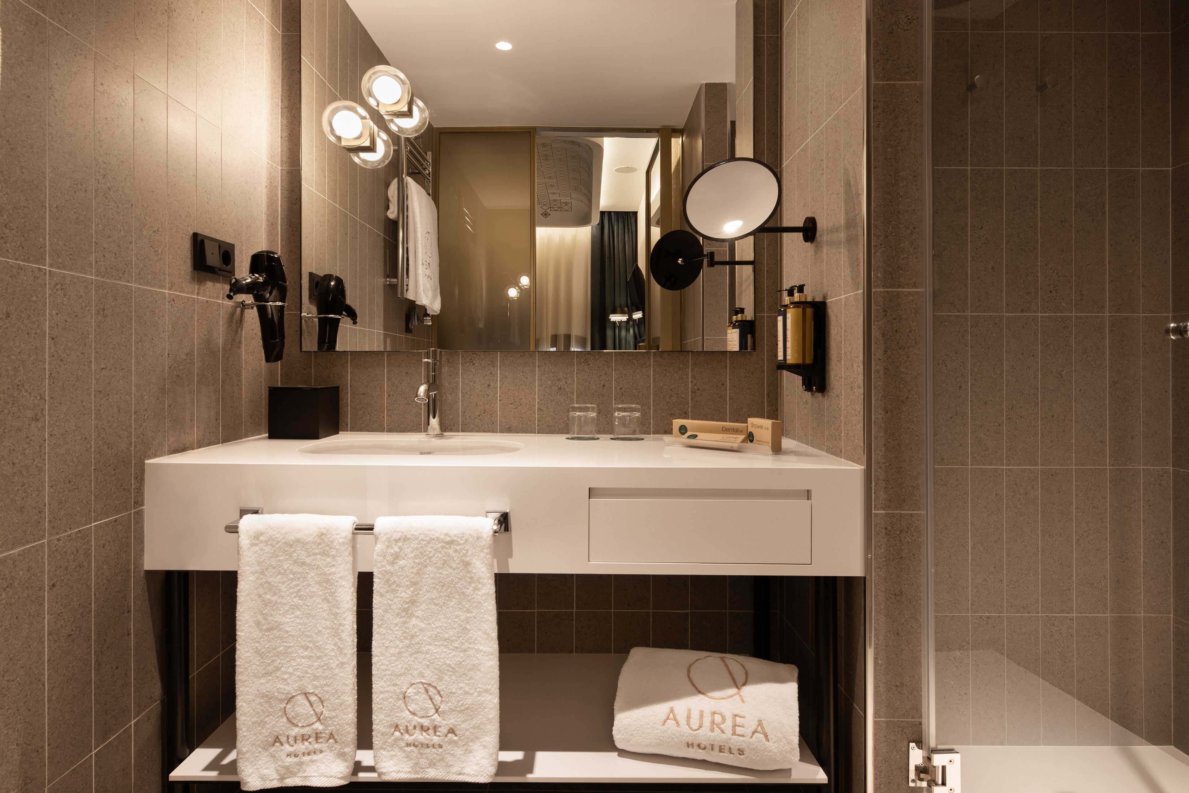 deluxe double room | bathroom | eco-friendly toiletries, hair dryer, towels, soap