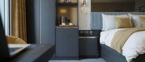 A modern hotel room with a bed, bedside tables, a built-in shelf, and a wall-mounted light fixture.