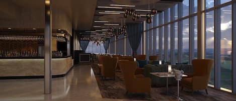 Un moderno área de descanso con bar, asientos cómodos y amplios ventanales con vistas.