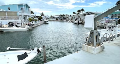 Canal front lot only. No house or RV. You need to bring your RV.