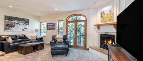 Flat-screen TV, fireplace