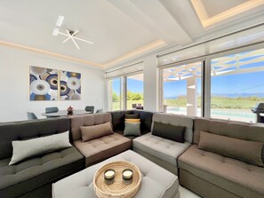 TV - Danune Luxury Beachfront Villa with private pool (Agnos beach)