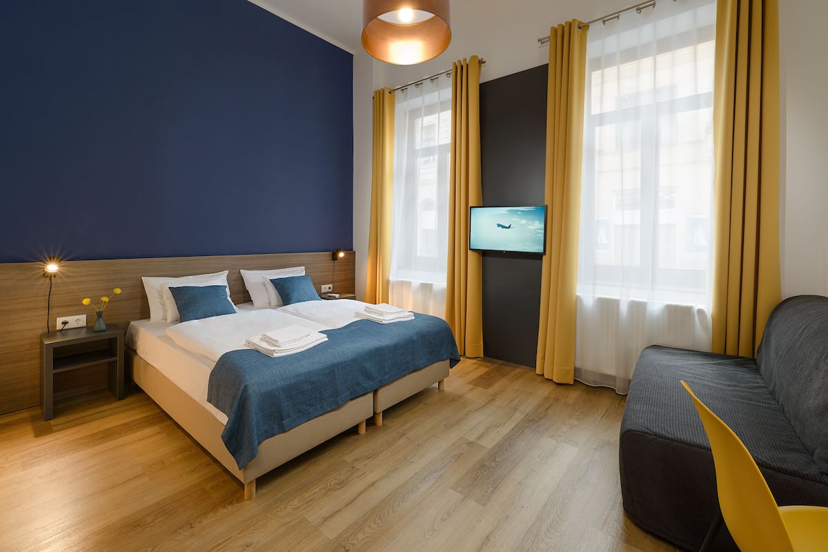 Junior Suite (2 people) | 1 bedroom, in-room safe, desk, laptop workspace
