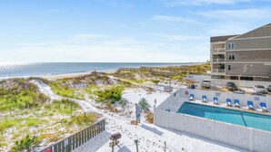 A beachside hotel with a pool, beach access, and a view of the ocean. - Sea Cabin 208 - Ocean View 2 Bed/2 Bath Condo (North Myrtle Beach)