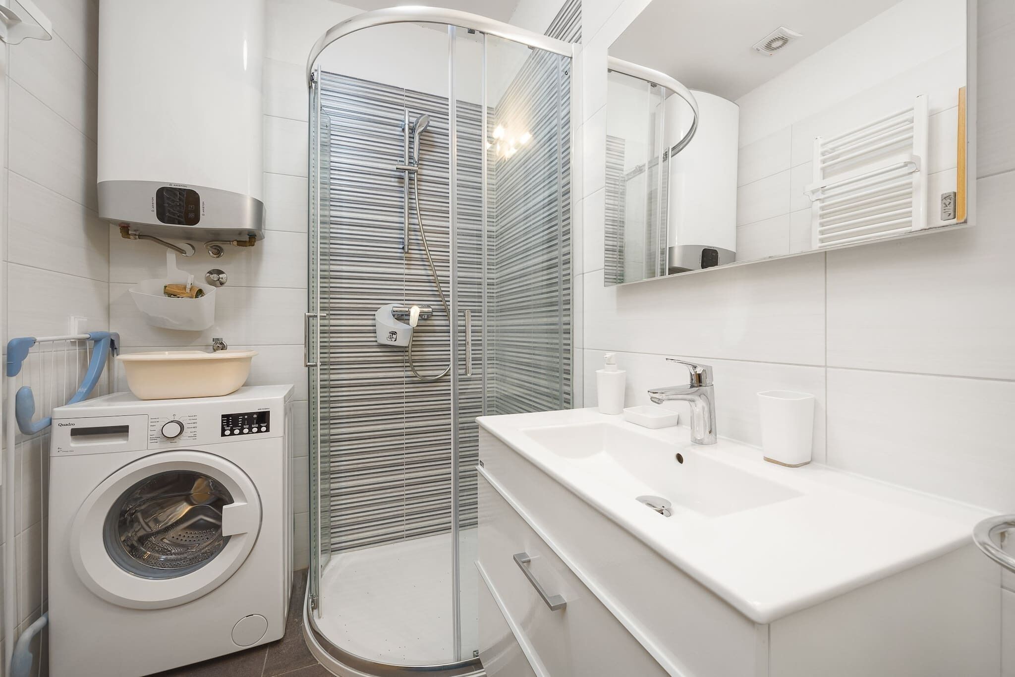 Shower, hair dryer, towels, toilet paper
