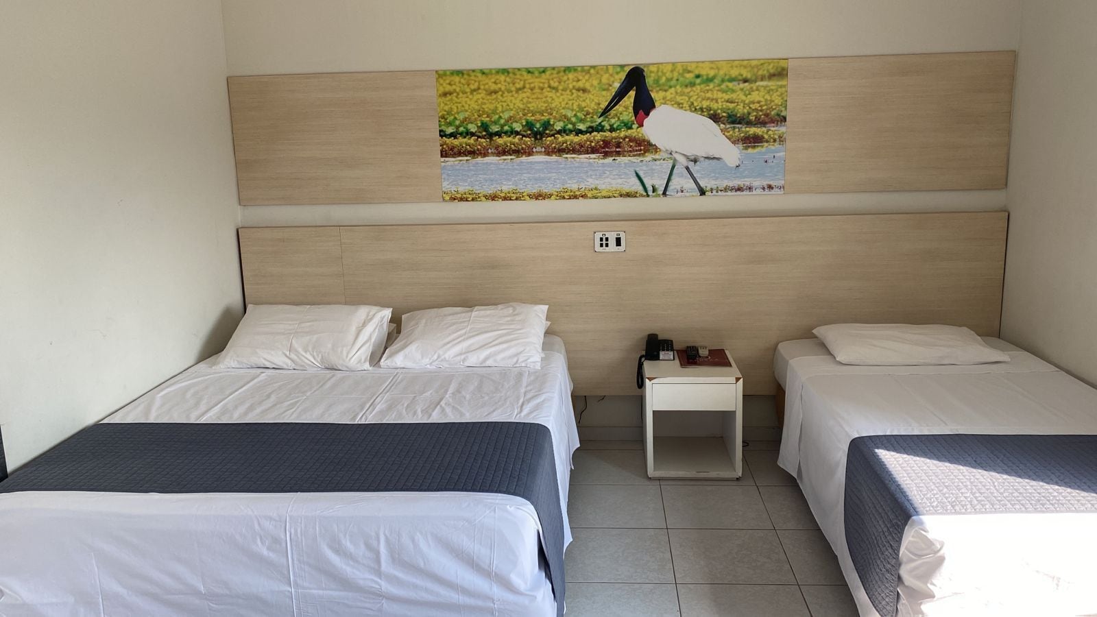 family room | 1 bedroom, minibar, free wifi, bed sheets