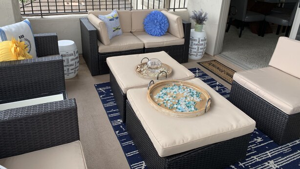 A sunlit outdoor seating area with wicker furniture, a cushioned sofa, and a dining table. - Beautiful Grayhawk Condo!  Negotiated rates and FLEXIBLE Dates-contact owner (Scottsdale)