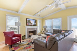 TV, fireplace, DVD player, books - "Breathe EZ" - Oceanfront Home, 4 Bedrooms / 3.5 Bathrooms (Holden Beach)