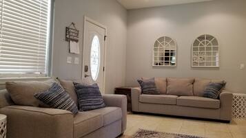 Smart TV, fireplace, DVD player, books