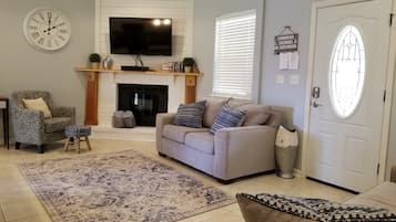 Smart TV, fireplace, DVD player, books