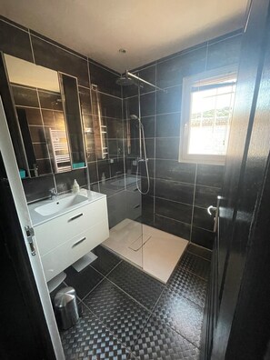 Shower, hair dryer, towels, soap