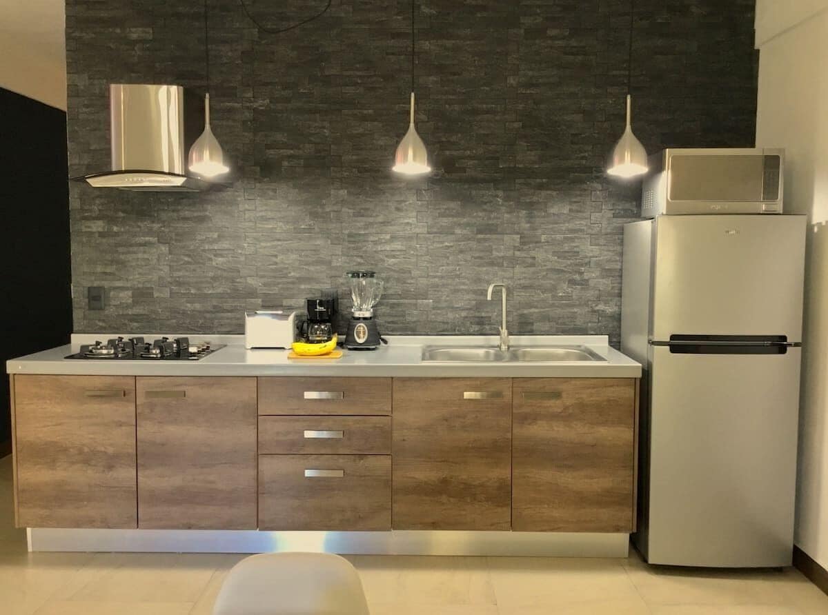 Fridge, microwave, stovetop, coffee/tea maker